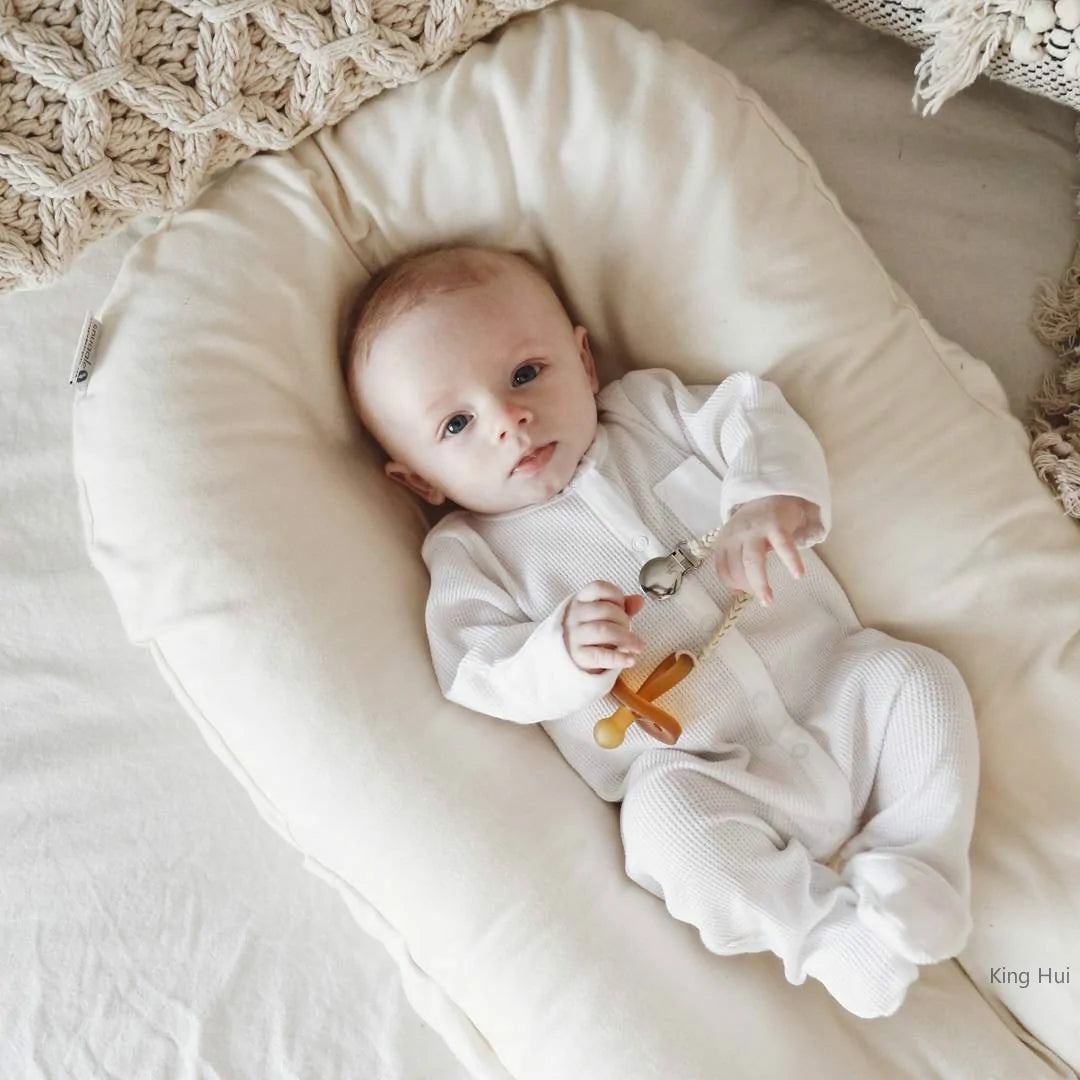 Newborn Lounger Bed – Soft, Secure, and Portable with Washable Cover