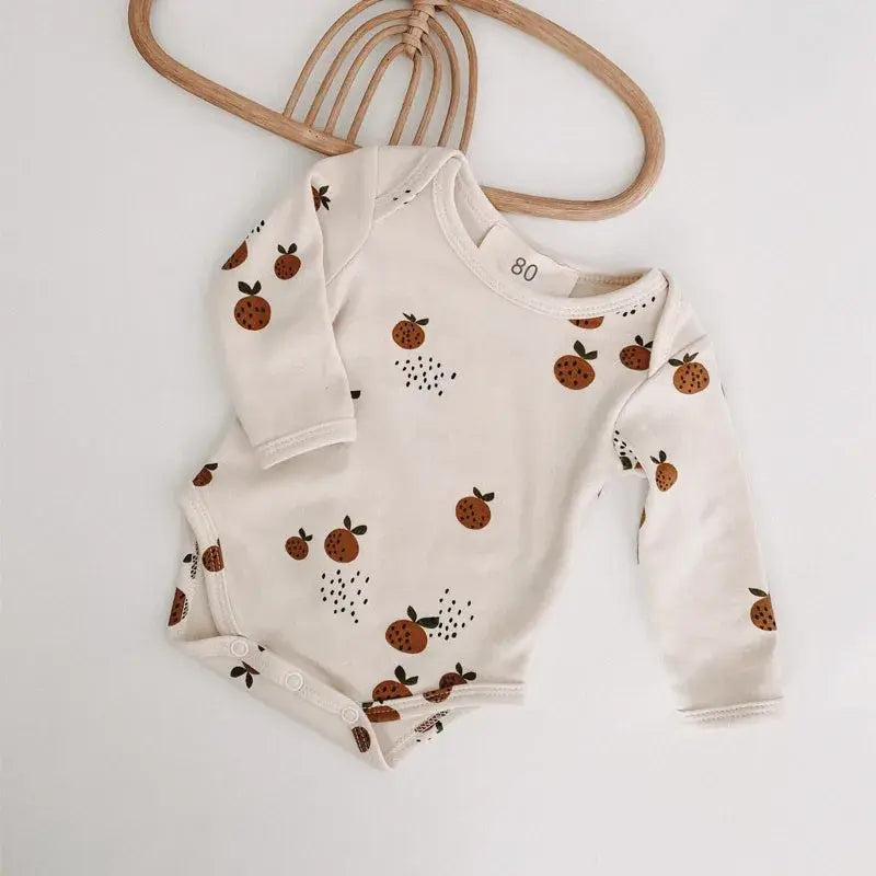 Little Clementine Playful Elegance Long Sleeve Bodysuit